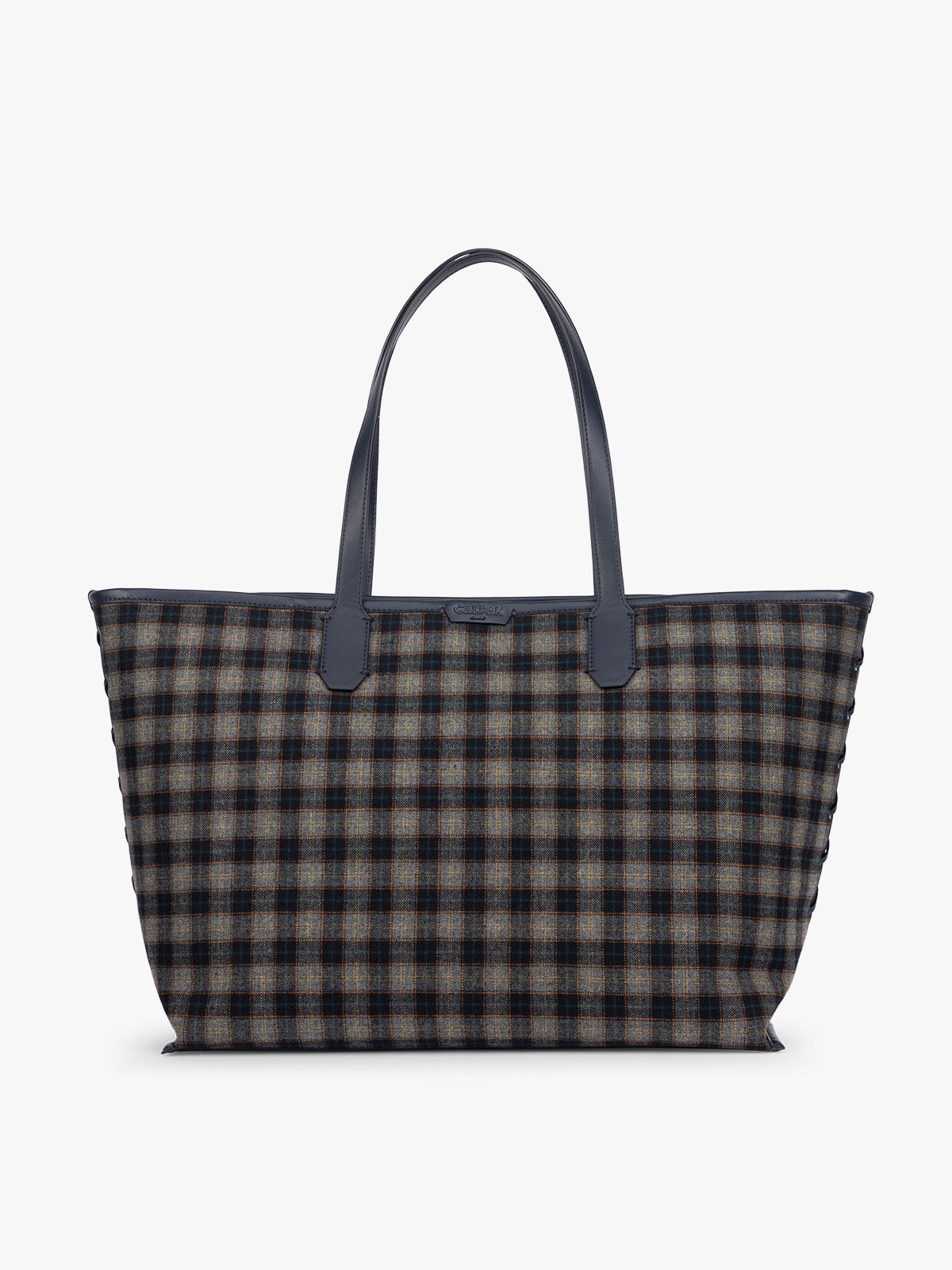 A CALPAK Colette 15" Laptop tote bag with a brown and navy blue plaid pattern and dark navy blue handles, shown against a plain white background; CLCT2601-NAVY-PLAID