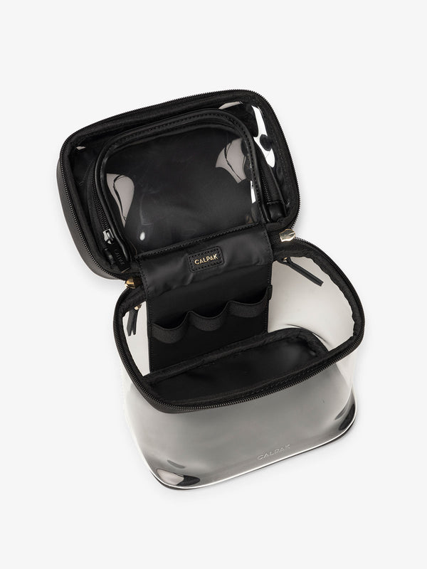 CALPAK Clear Train Case with Top Compartment with interior pocket and elastic loops in black