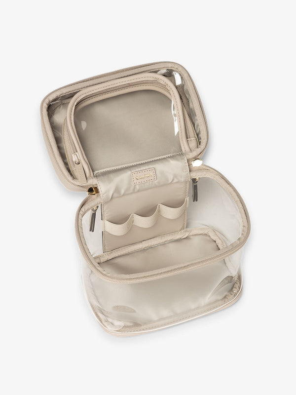 CALPAK Clear Train Case with Top Compartment with interior pocket and elastic loops in beige stone