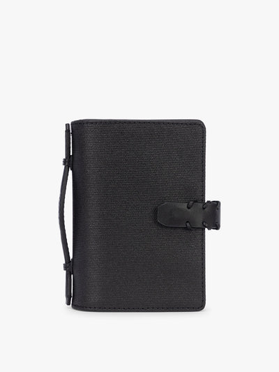CALPAK Colette Multi Passport Wallet in Black canvas material ; CLPW2601-BLACK view 1