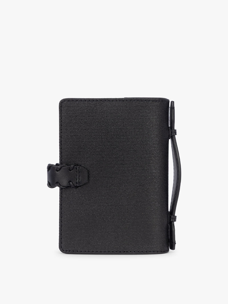 Backside of CALPAK Colette Multi Passport Wallet in Black canvas material