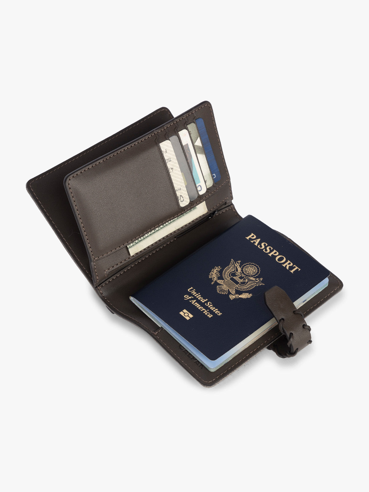 Opened with passport and card slots of CALPAK Colette Multi Passport Wallet in brown Mushroom canvas material; CLPW2601-MUSHROOM