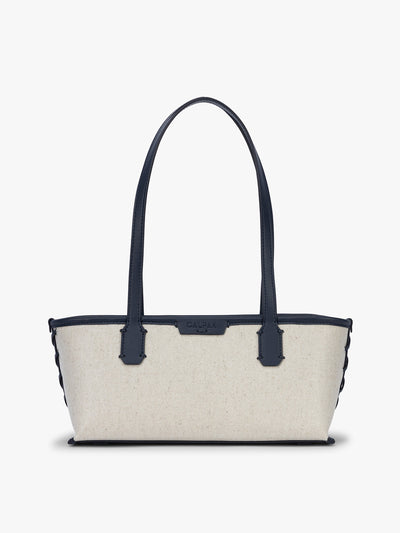 CALPAK Colette Canvas Shoulder Tote in beige canvas material  and blue finishing; CLST2601-NATURAL-NAVY view 1
