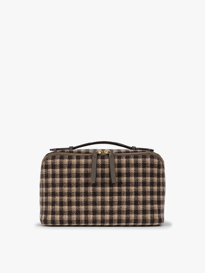 Toiletry bag with zipper and top handle in a brown plaid from CALPAK in Mushroom Plaid shown against a grey background; CLTB2601-MUSHROOM-PLAID