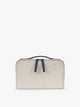 CALPAK Colette Lay-Flat Canvas Toiletry Bag in beige canvas material and blue finishing; CLTB2601-NATURAL-NAVY