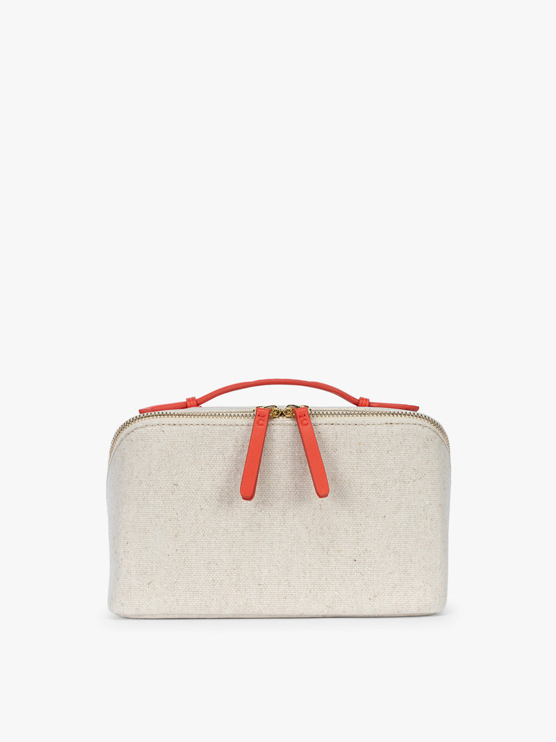CALPAK Colette Lay-Flat Canvas Toiletry Bag in beige material and red finishing