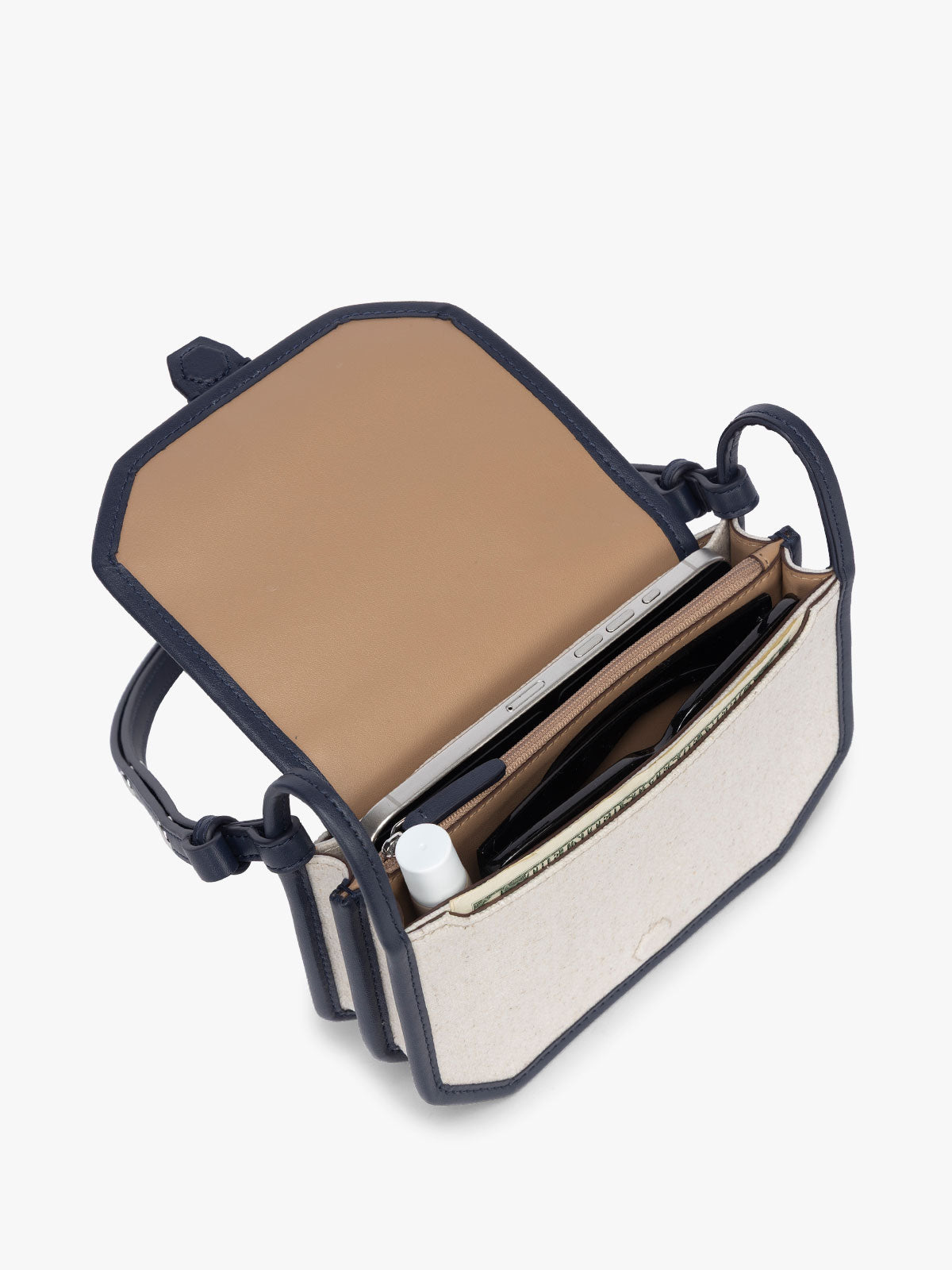 Opened CALPAK Colette Canvas Crossbody Wallet Bag in Natural Brown with beige canvas material and blue finishing; CLWC2601-NATURAL-NAVY