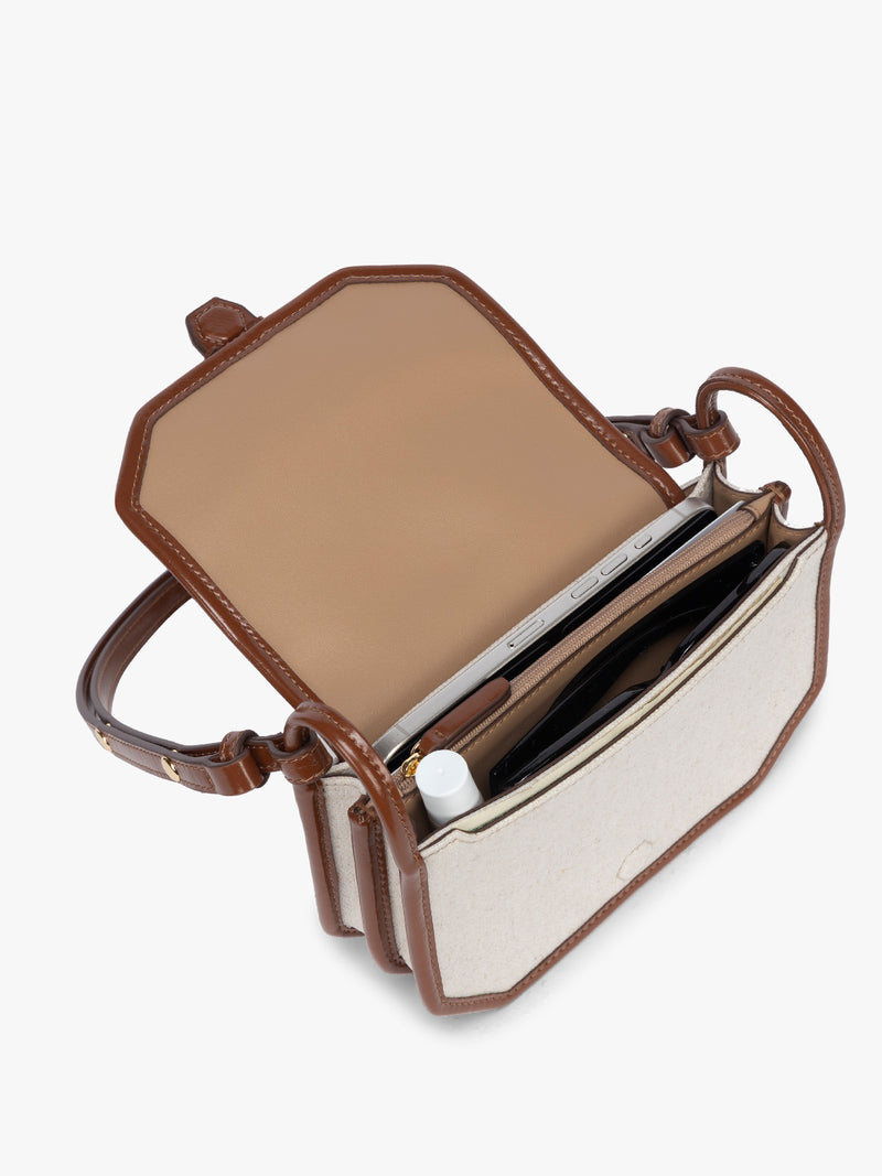 Opened CALPAK Colette Canvas Crossbody Wallet Bag in Natural Brown with beige canvas  material and brown finishing