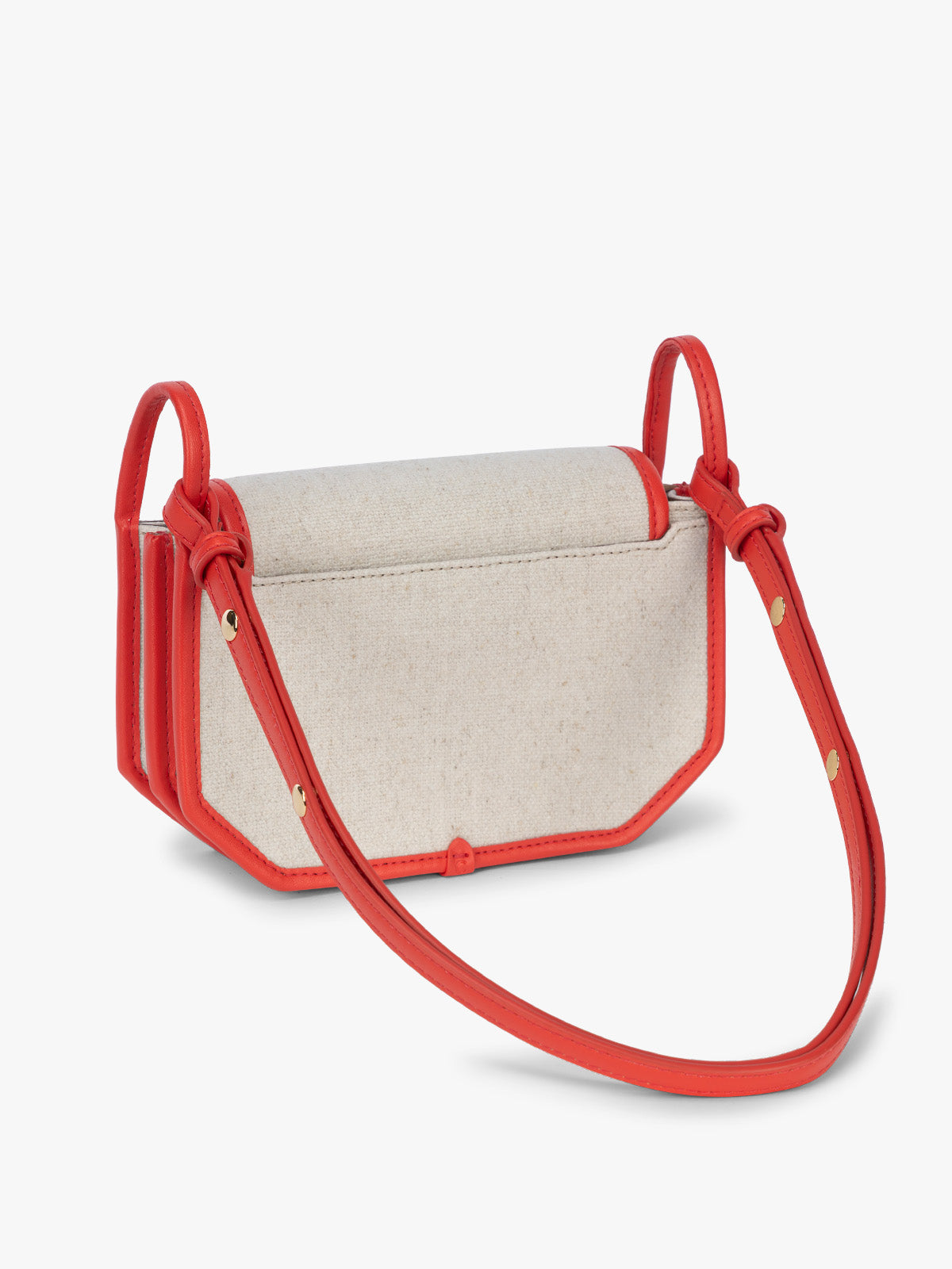 Backside of CALPAK Colette Canvas Crossbody Wallet Bag in Natural Brown with beige canvas material and red finishing; CLWC2601-NATURAL-TOMATO