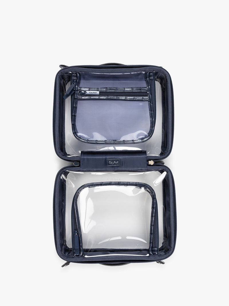 Opened CALPAK Medium Clear Cosmetics Case that is a transparent pouch with a deep blue Navy in crocodile-embossed