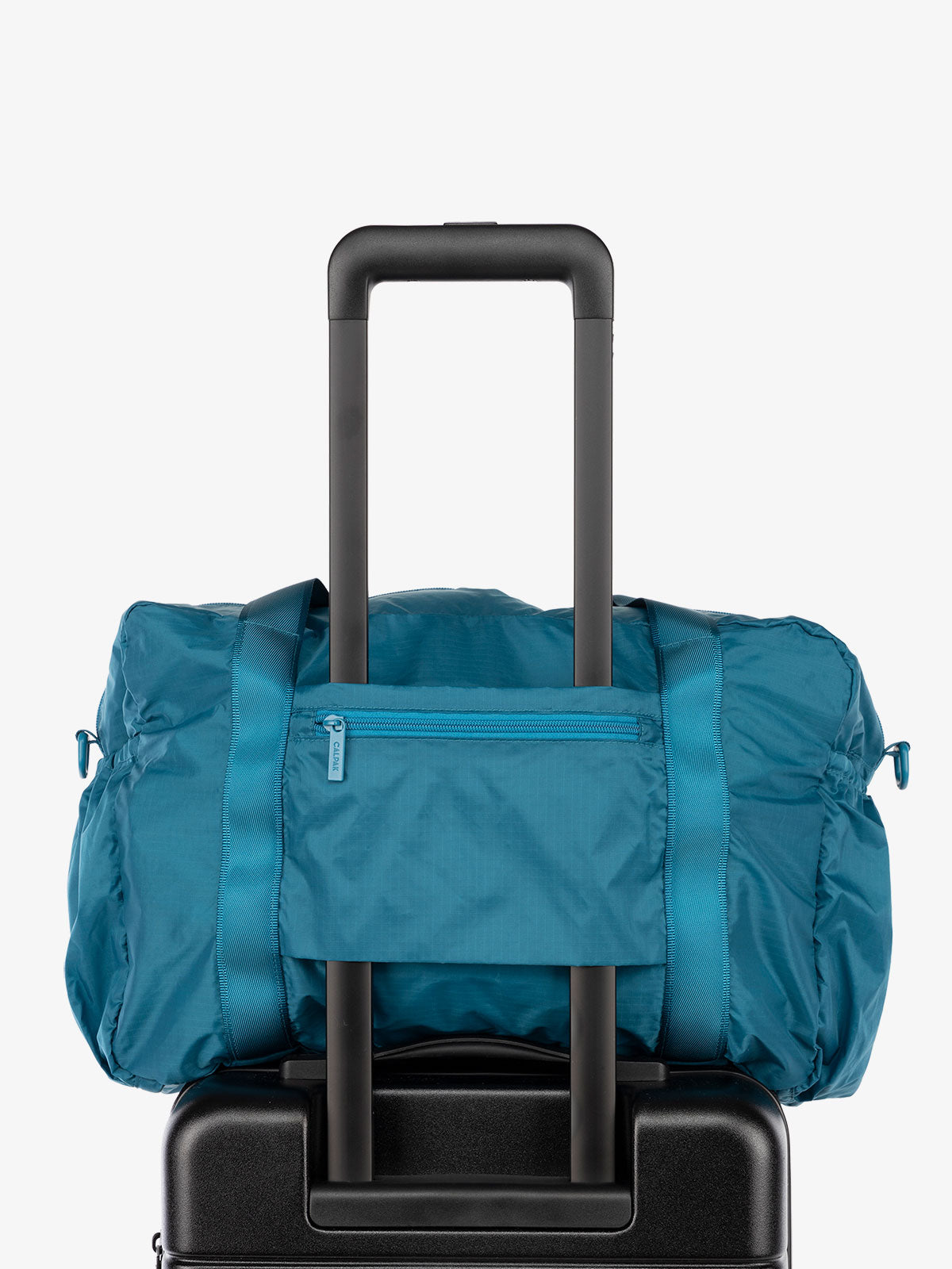 CALPAK Compakt nylon duffle bag with trolley sleeve in blue