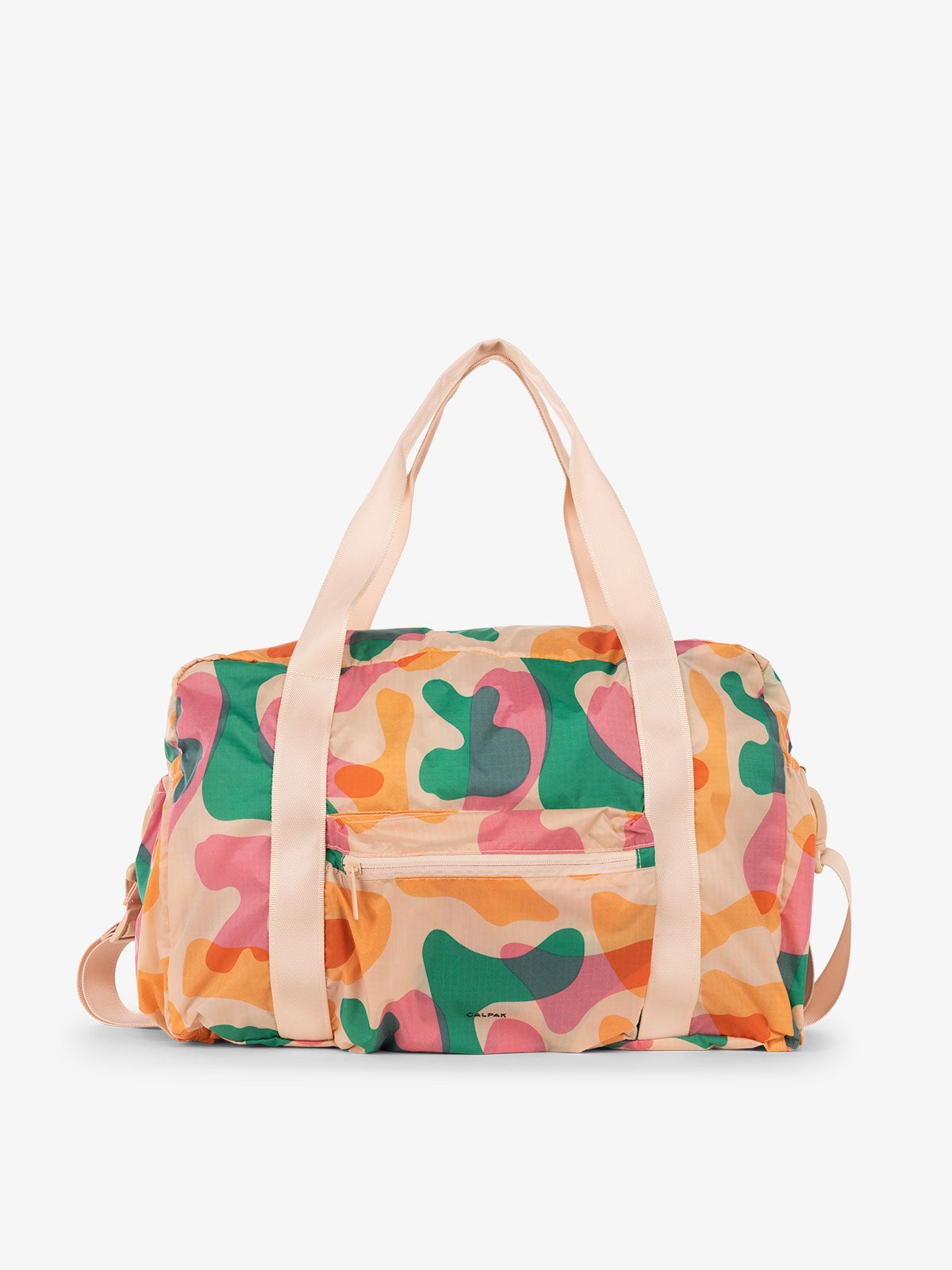 CALPAK Compakt duffel bag with removable crossbody strap and water resistant fabric in modern abstract
