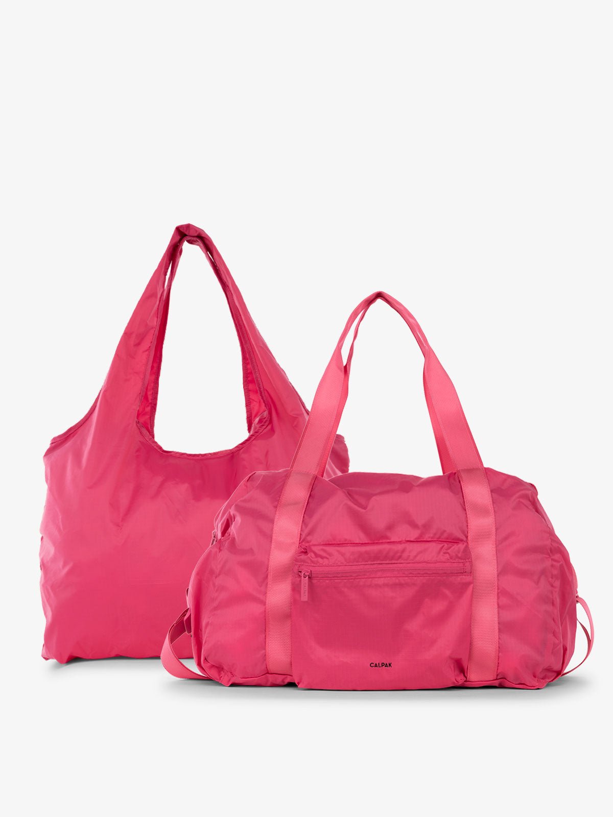 CALPAK Compakt Duo with tote bag and duffel bag in pink dragonfruit