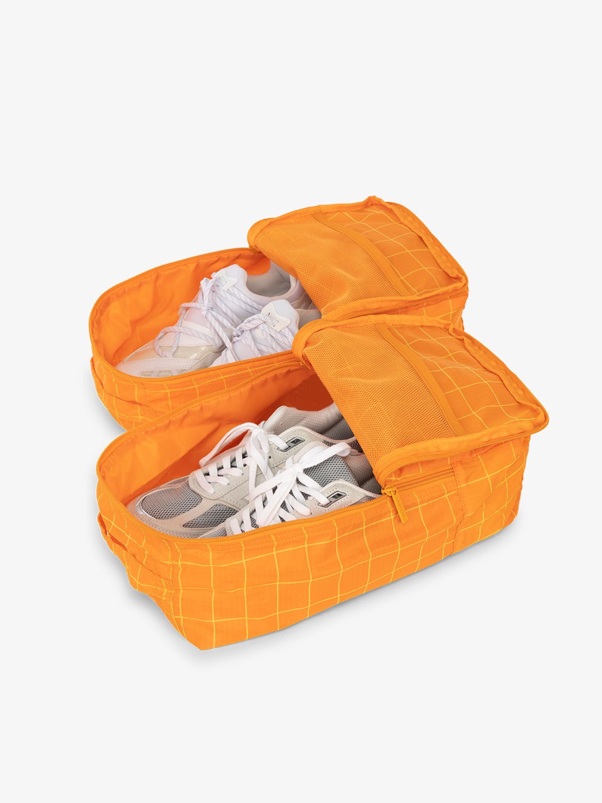CALPAK Compakt shoe bag set with mesh pockets for travel in orange grid