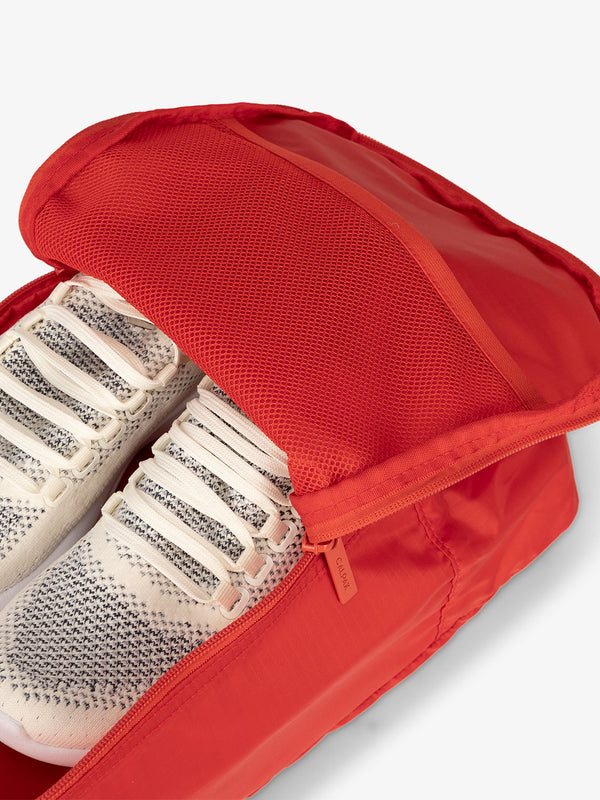 CALPAK Compakt zippered shoe travel bag with mesh pocket in red