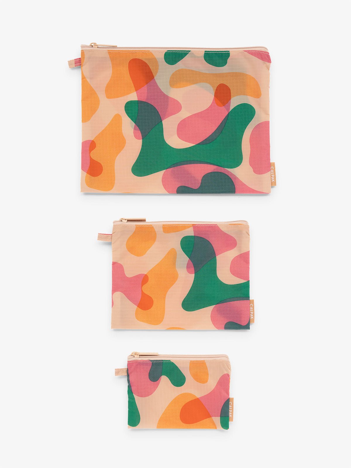 CALPAK Compakt water resistant zippered pouch set for organization in pink and green abstract print