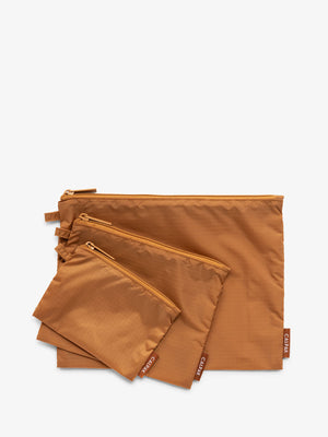 CALPAK Compakt zippered pouches in brown camel; KZB2001-CAMEL