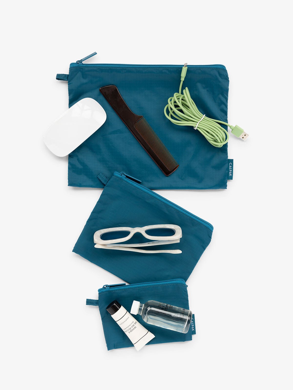 CALPAK Compakt 3 piece zippered pouch set in 3 sizes with water resistant material in lagoon blue