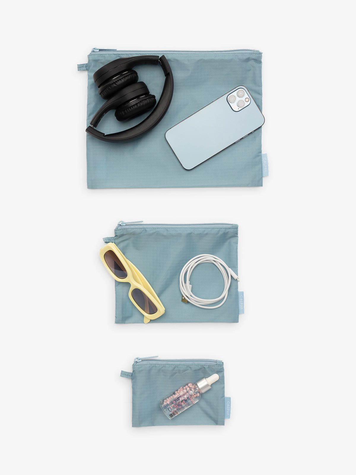 CALPAK Compakt 3 piece zippered pouch set in 3 sizes with water resistant material in powder blue; KZB2001-POWDER-BLUE