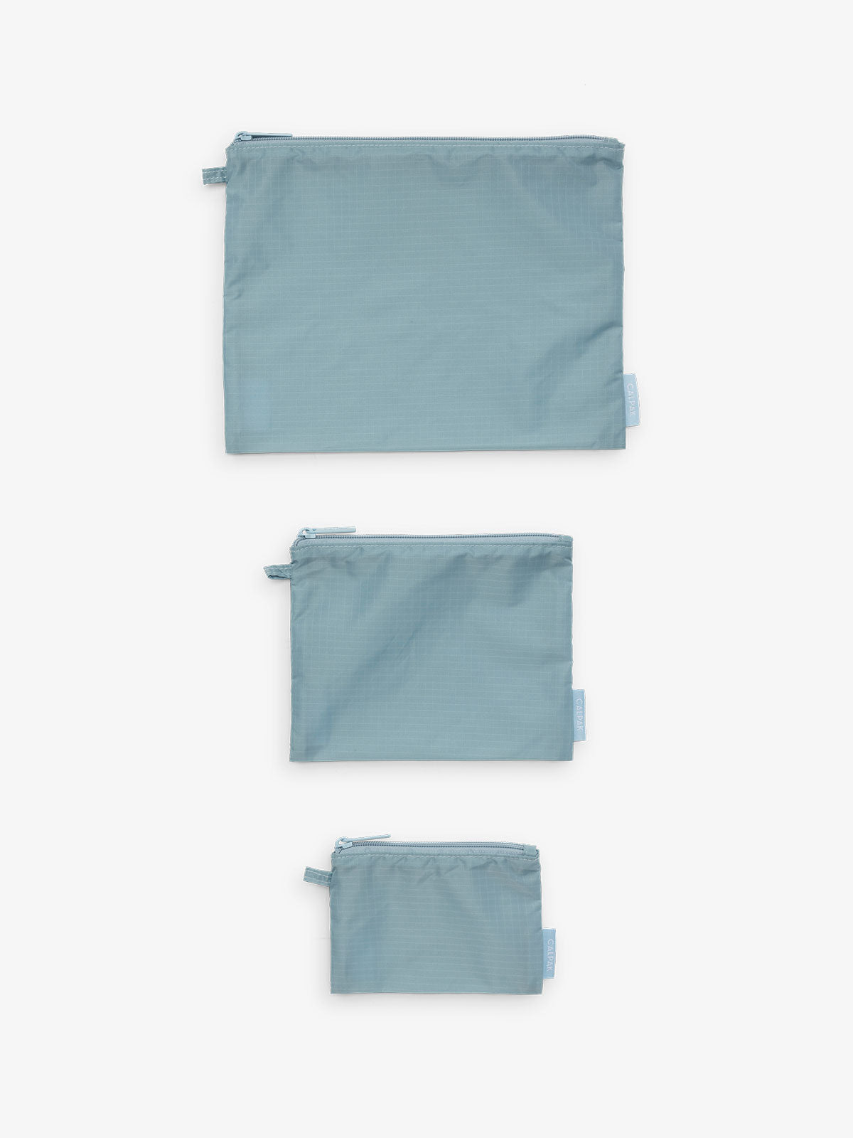 CALPAK Compakt water resistant zippered pouch set for organization in blue; KZB2001-POWDER-BLUE