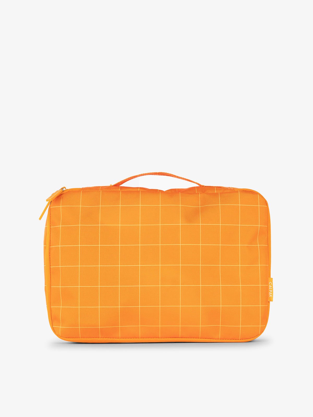 CALPAK packing cubes with top handle in orange grid print