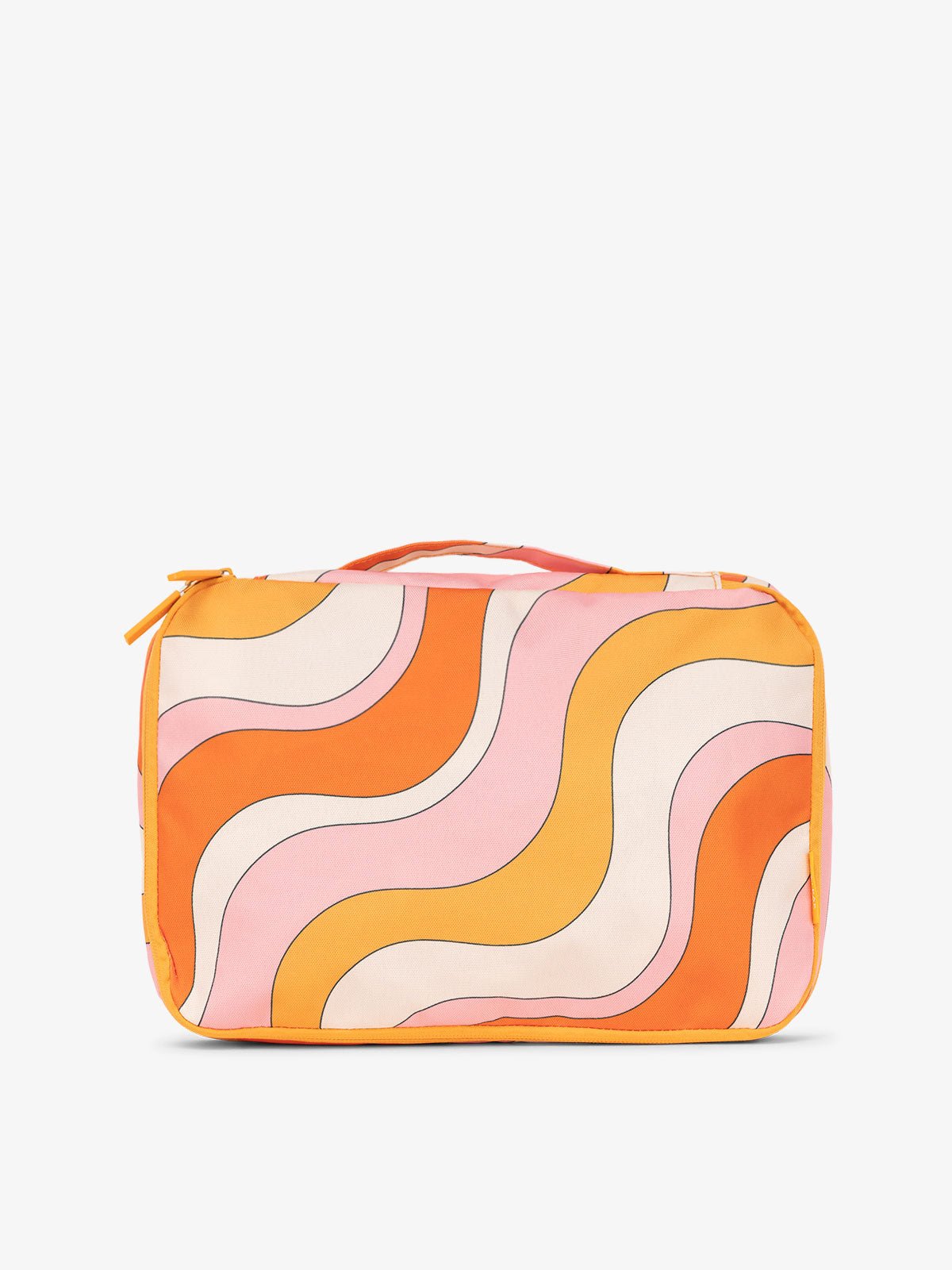 CALPAK packing cubes with top handle in orange and pink wavy print