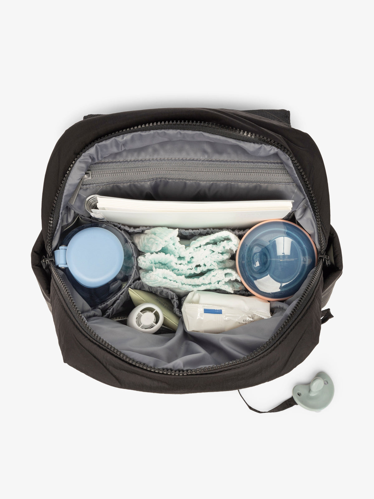 CALPAK mini diaper backpack with multiple interior pockets, bottle pockets, and 11 inch tablet sleeve in black; BBPC2401-BLACK, BPC2401-BLACK
