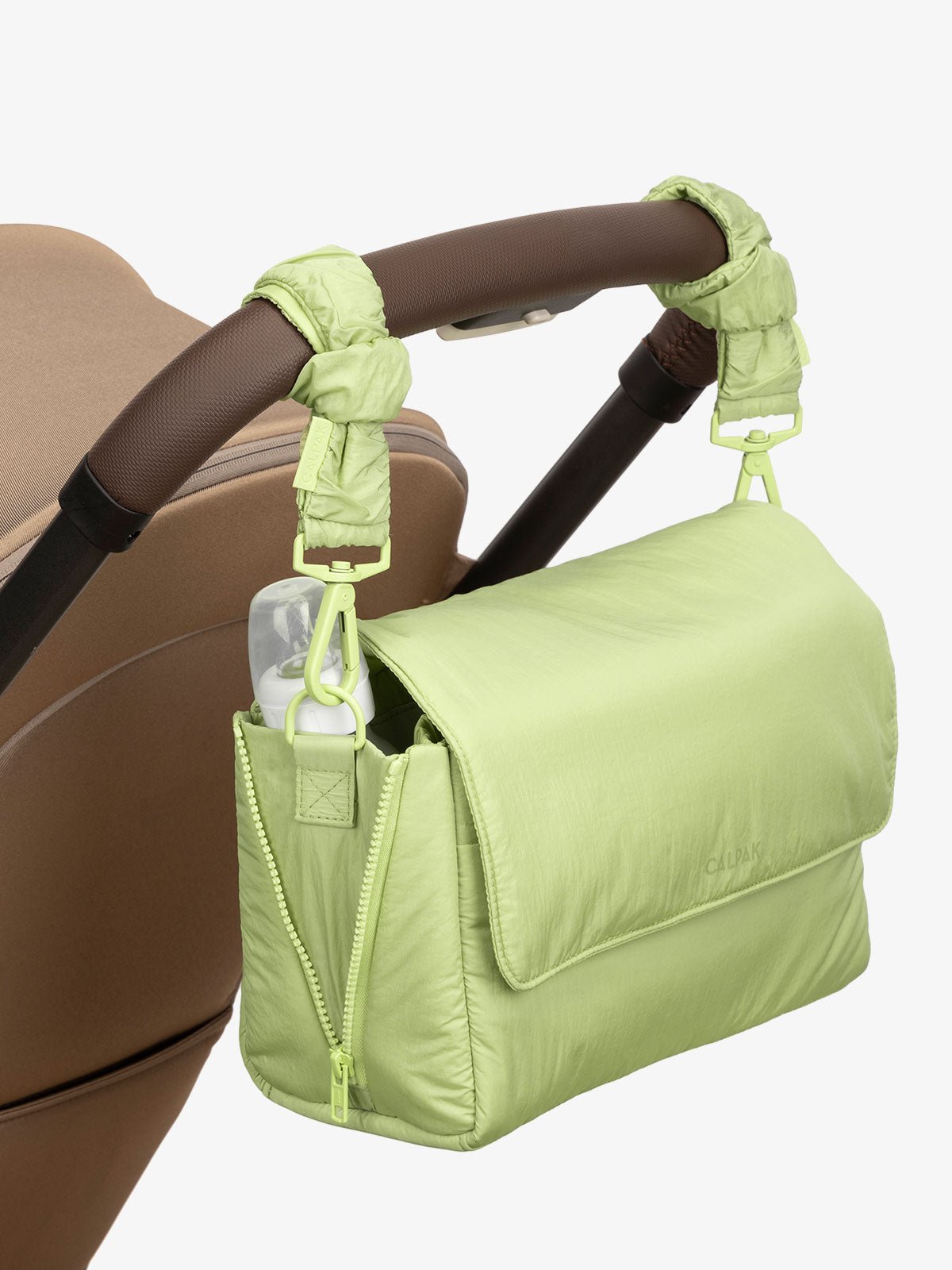 CALPAK Convertible Stroller Caddy Crossbody with included stroller straps in lime green