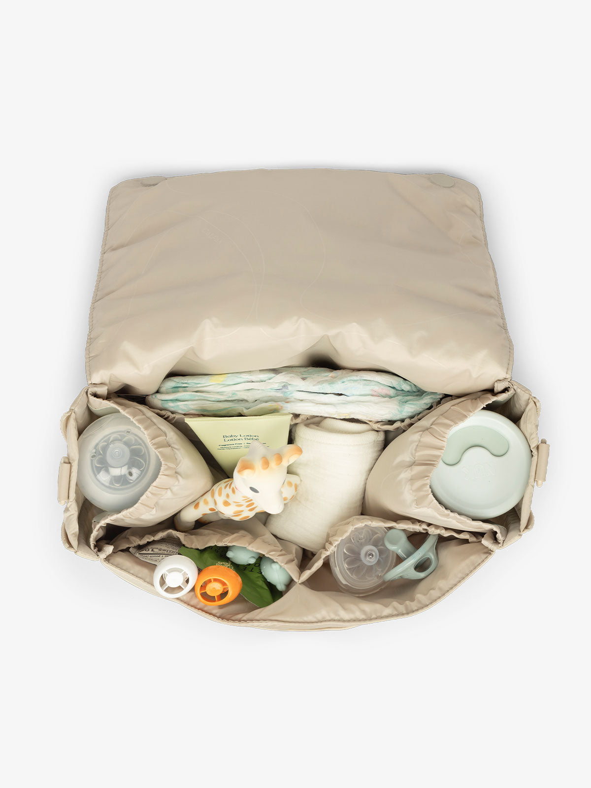 CALPAK convertible stroller caddy crossbody bag with 2 insulated bottle pockets, multiple interior pockets, and expandable sides for extra storage space in oatmeal; SCB2401-OATMEAL