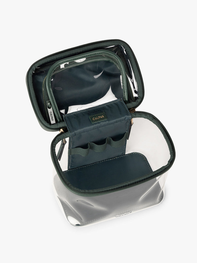 Opened view of CALPAK Clear Train Case in dark green Emerald