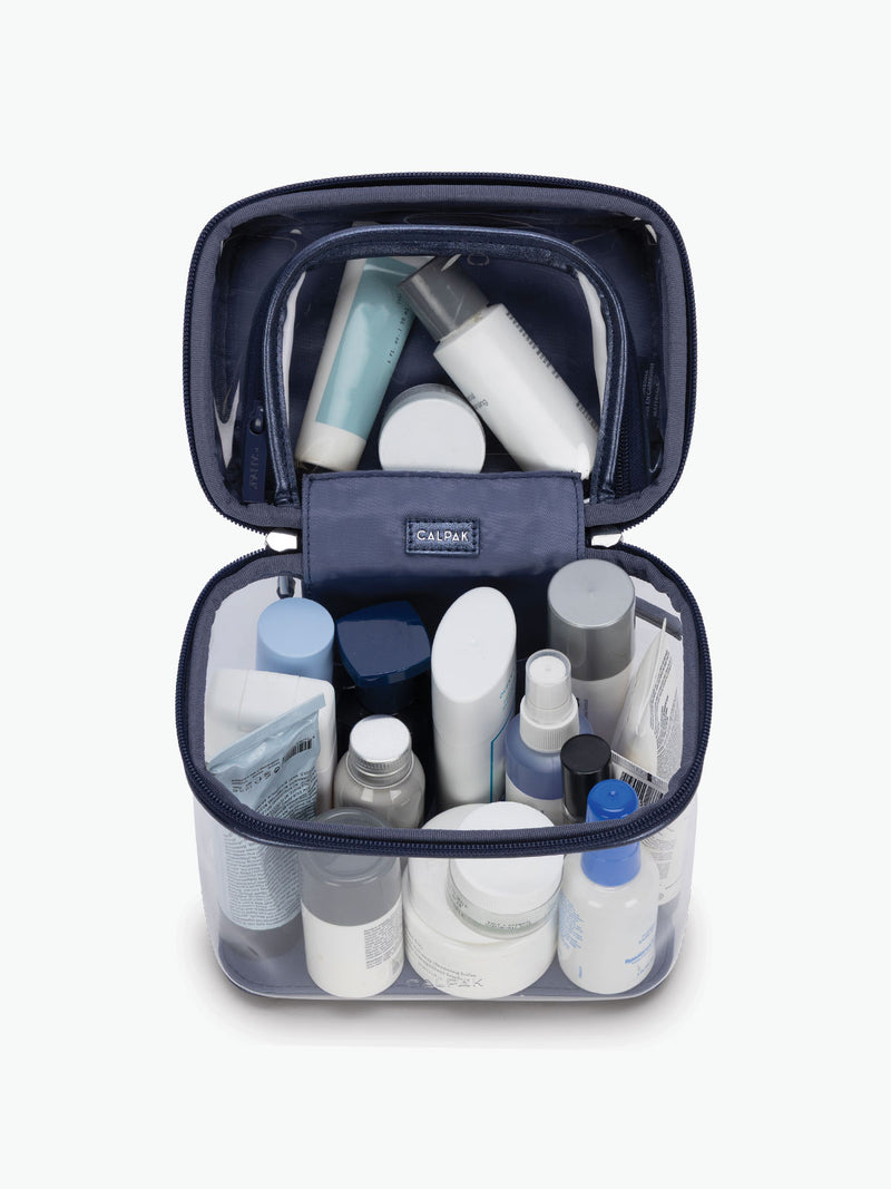 Toiletries in the CALPAK Clear Cosmetic Case in dark blue Metallic Blue