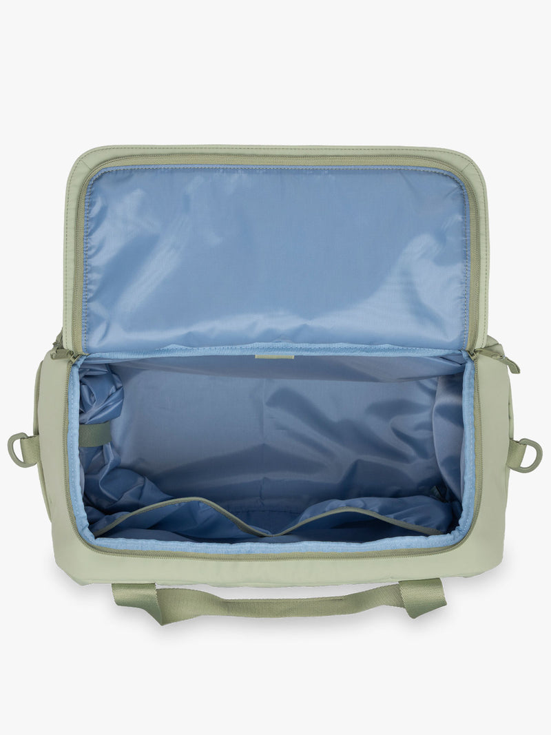 CALPAK Laptop Duffel in light green Meadow opened view with white background