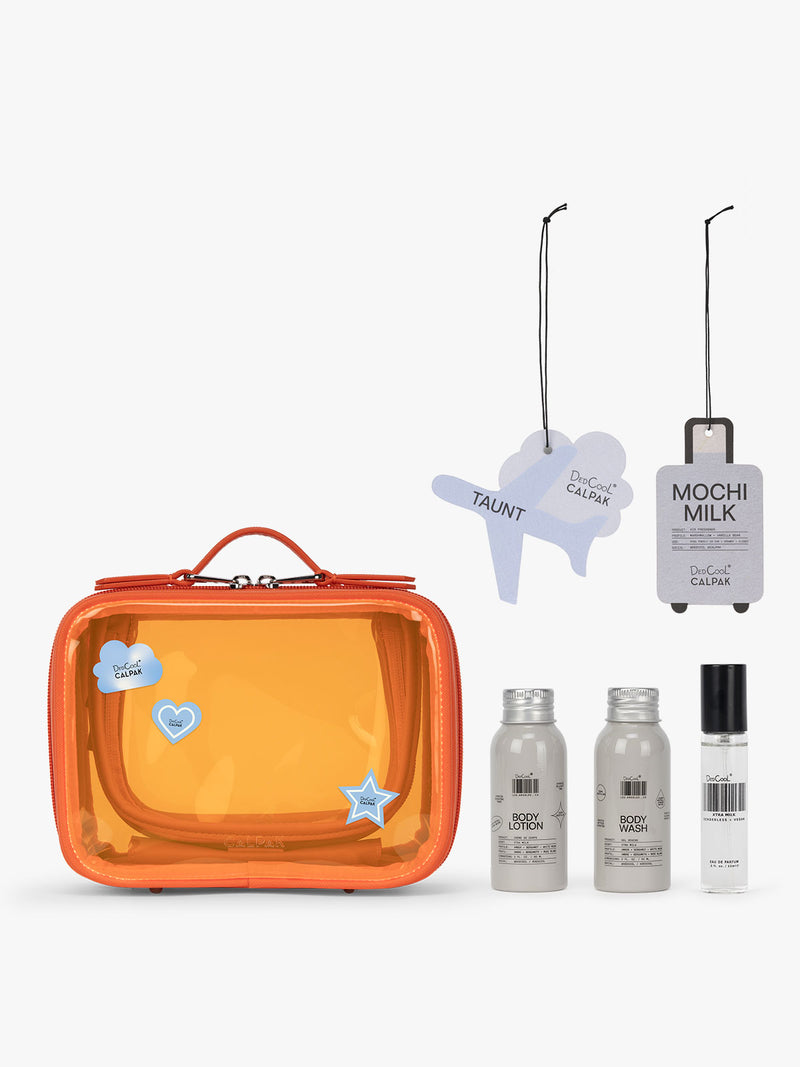 CALPAK x Dedcool Collaboration of the Small Clear Cosmetic Case in orange Papaya with toiletry items and perfumes