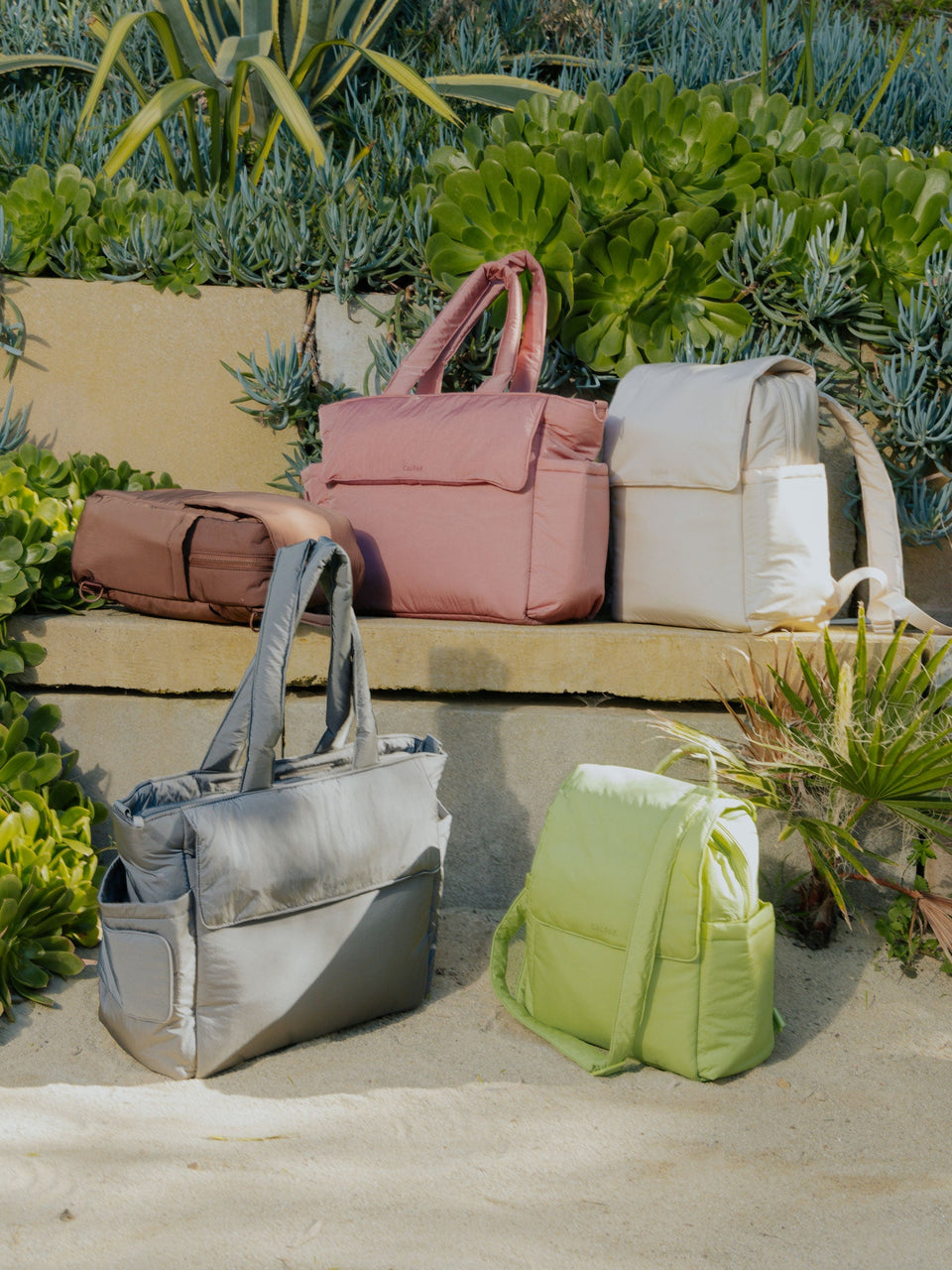CALPAK Baby Collection featuring Diaper Backpack with Laptop Sleeve in Oatmeal, Convertible Mini Diaper Backpack in lime and hazelnut and Diaper Tote Bag with Laptop Sleeve in slate and peony; BPB2401-OATMEAL, BBPB2401-OATMEAL