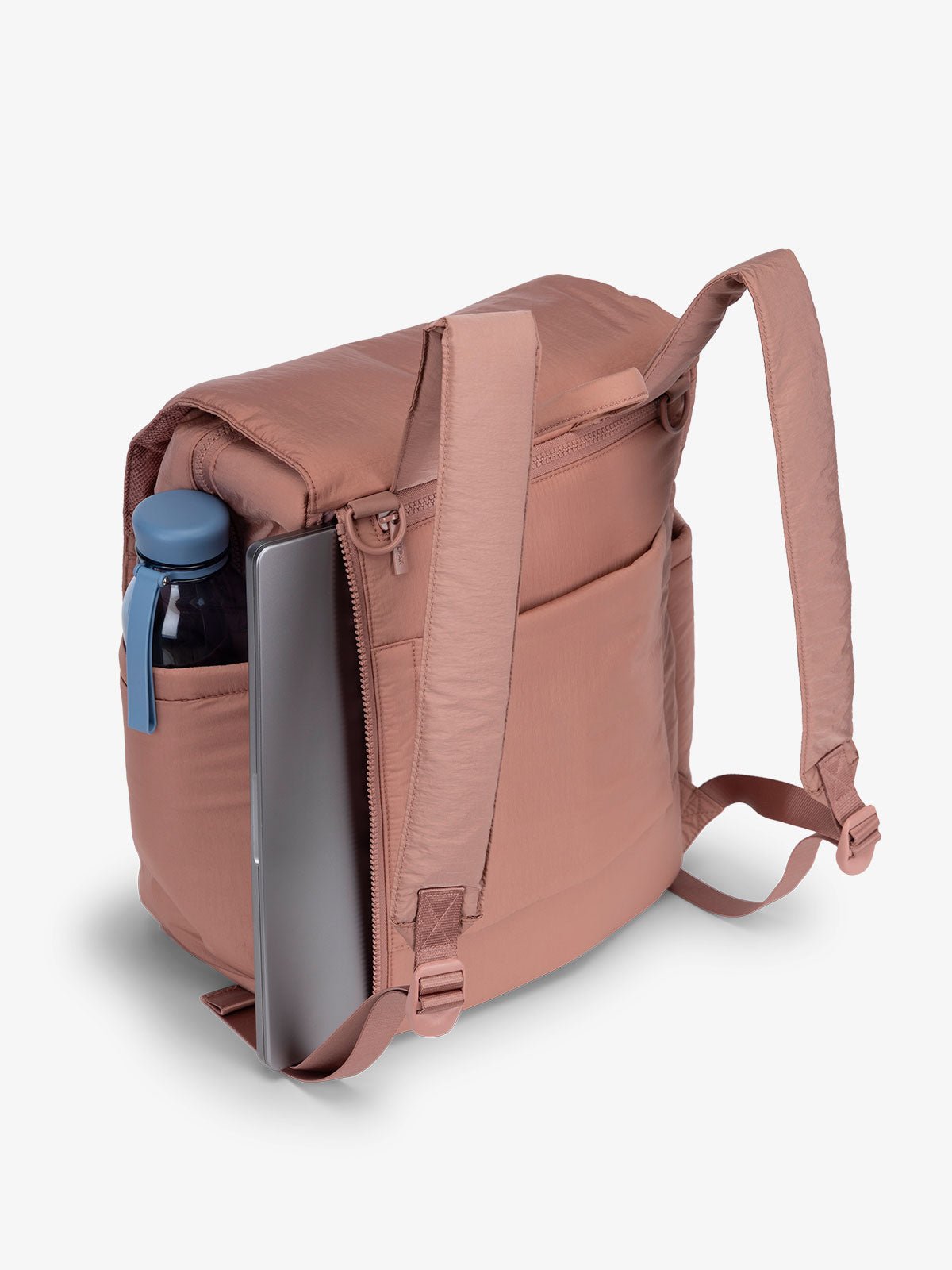 Pink CALPAK diaper backpack with 14 inch laptop sleeve and adjustable shoulder straps