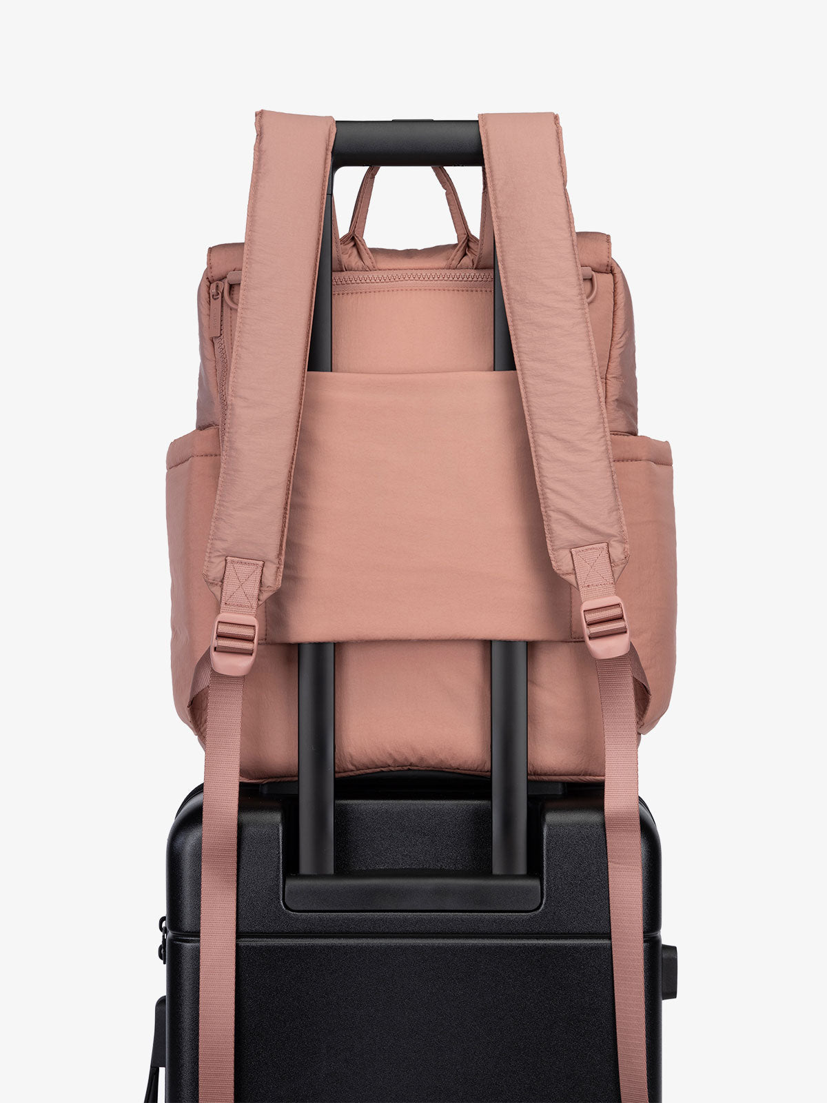 CALPAK Diaper Backpack with Laptop Sleeve featuring luggage trolley sleeve with hidden pocket in pink; BPB2401-PEONY, BBPB2401-PEONY