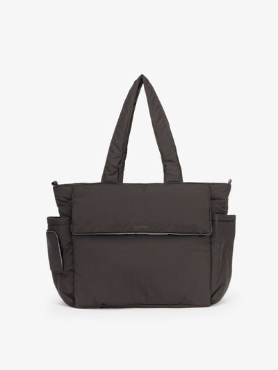 CALPAK Diaper Tote Bag with Laptop Sleeve made with durable, recycled, water-resistant material and a magnetic front pocket closure in black; TBB2401-BLACK view 1