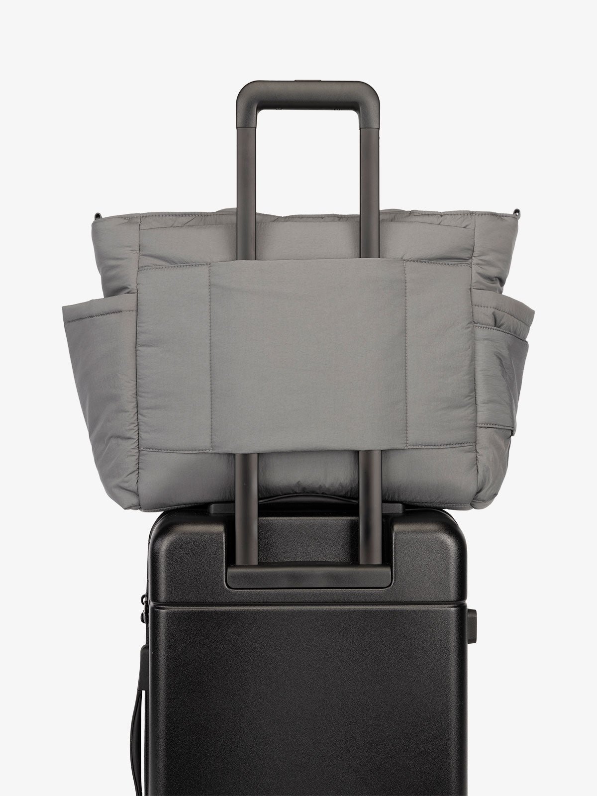 CALPAK Diaper Tote Bag with Laptop Sleeve featuring luggage trolley sleeve with back pocket in slate gray