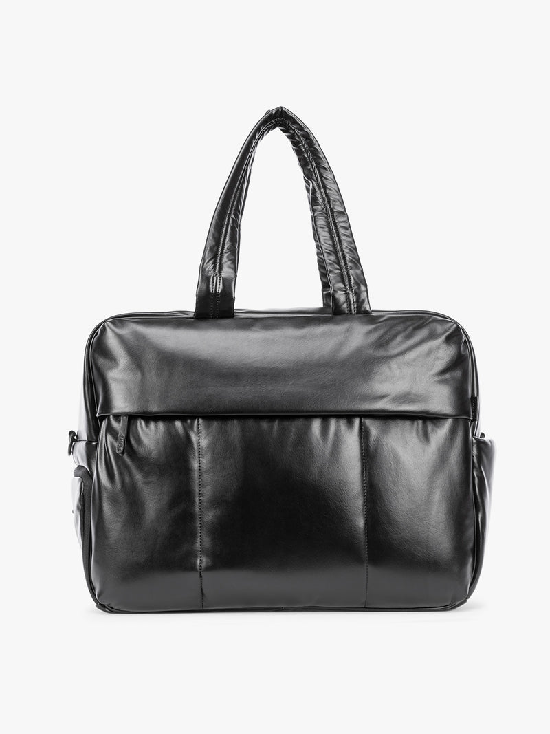 Black CALPAK Luka Large Duffel in vegan leather with dual top handles, shown against a plain white background