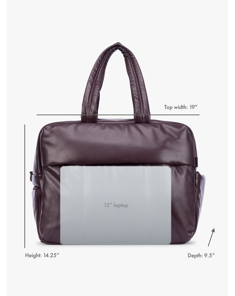 Dark Cherry deep burgundy CALPAK Luka Large Duffel in vegan leather with dual top handles, shown against a plain white background showing dimensions and laptop fit