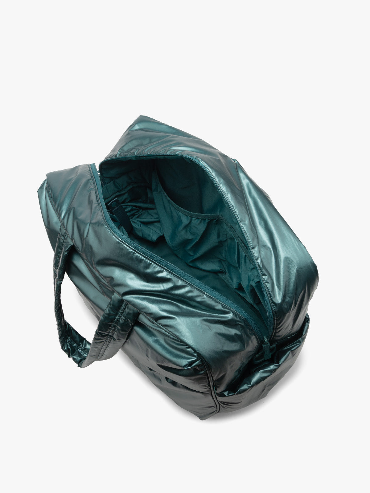 A metallic teal-green puffer CALPAK Luka Large Duffel bag shown open from an overhead angle, revealing a matching green interior, on a clean white background; DLL2201-GLAZED-KALE