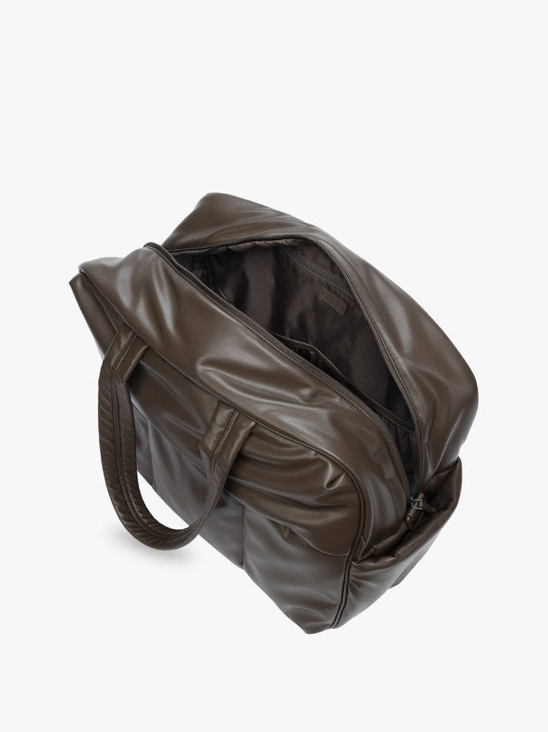 Top view with zipper open showing inside of Mushroom dark brown CALPAK Luka Large Duffel in vegan leather with dual top handles, shown against a plain white background