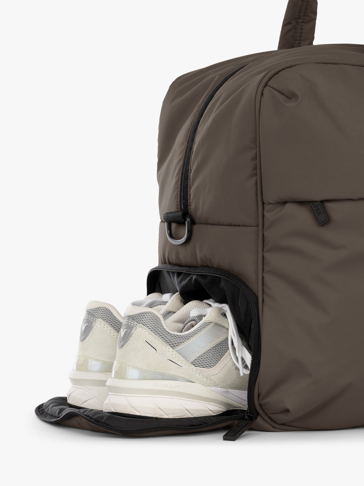 Shoe compartment of CALPAK Luka Large Duffel in brown Mushroom; DLL2201-MUSHROOM
