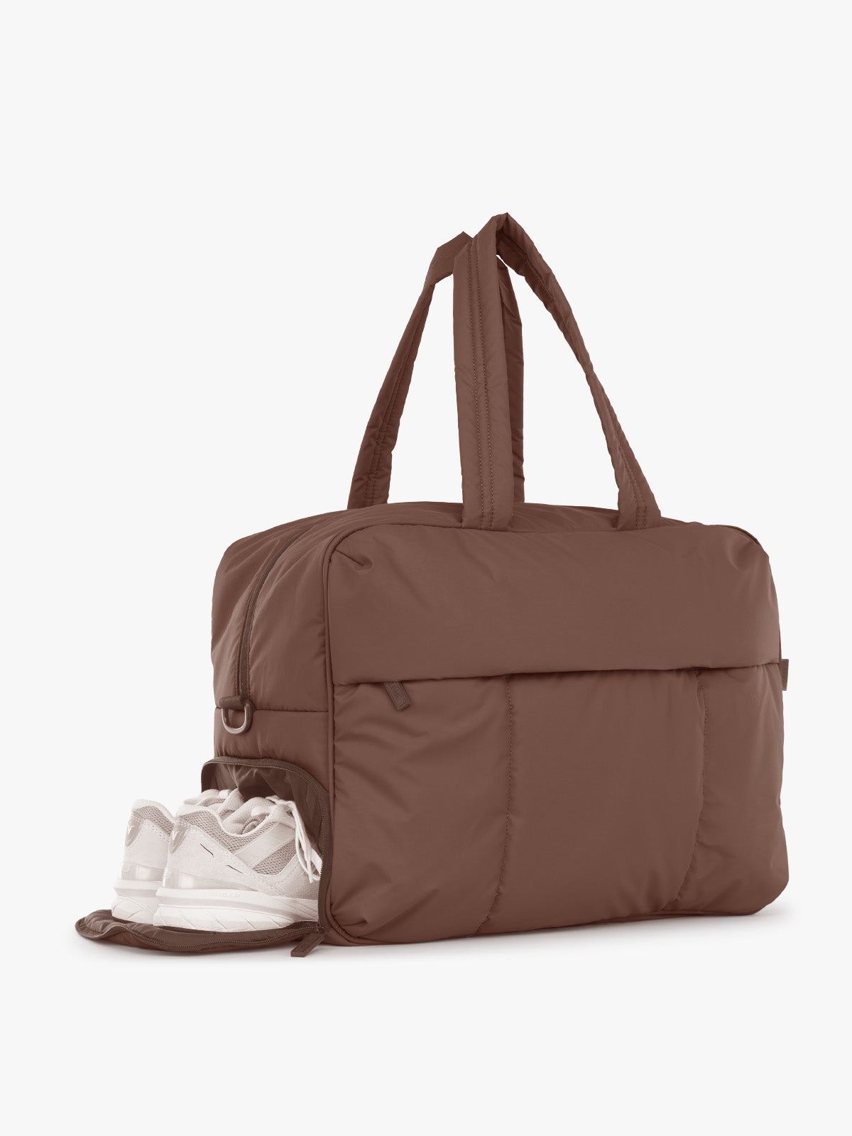 Shoe compartment view of CALPAK Luka Large Duffel in brown Walnut front view with a grey studio background; DLL2201-WALNUT