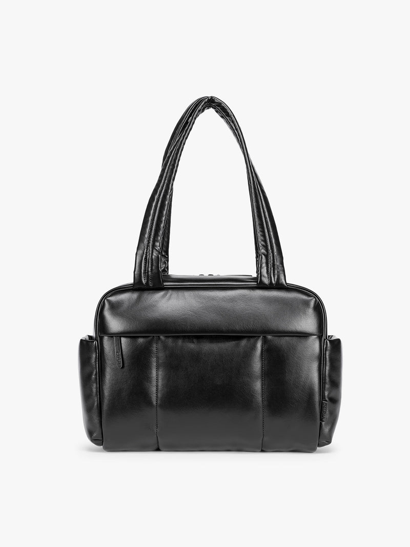 Black vegan leather CALPAK Luka Mini Duffel with dual top handles and side pockets, photographed against a clean white background