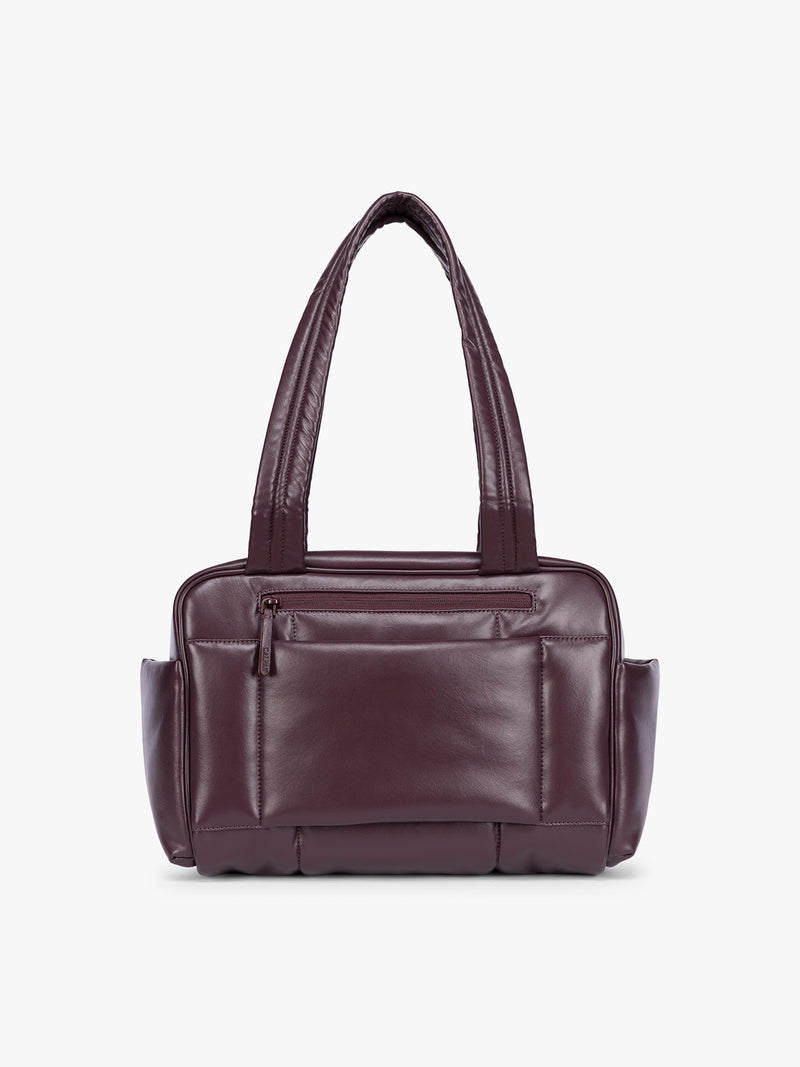 Backside of Dark burgundy Dark Cherry vegan leather CALPAK Luka Mini Duffel with dual top handles and side pockets, photographed against a clean white background