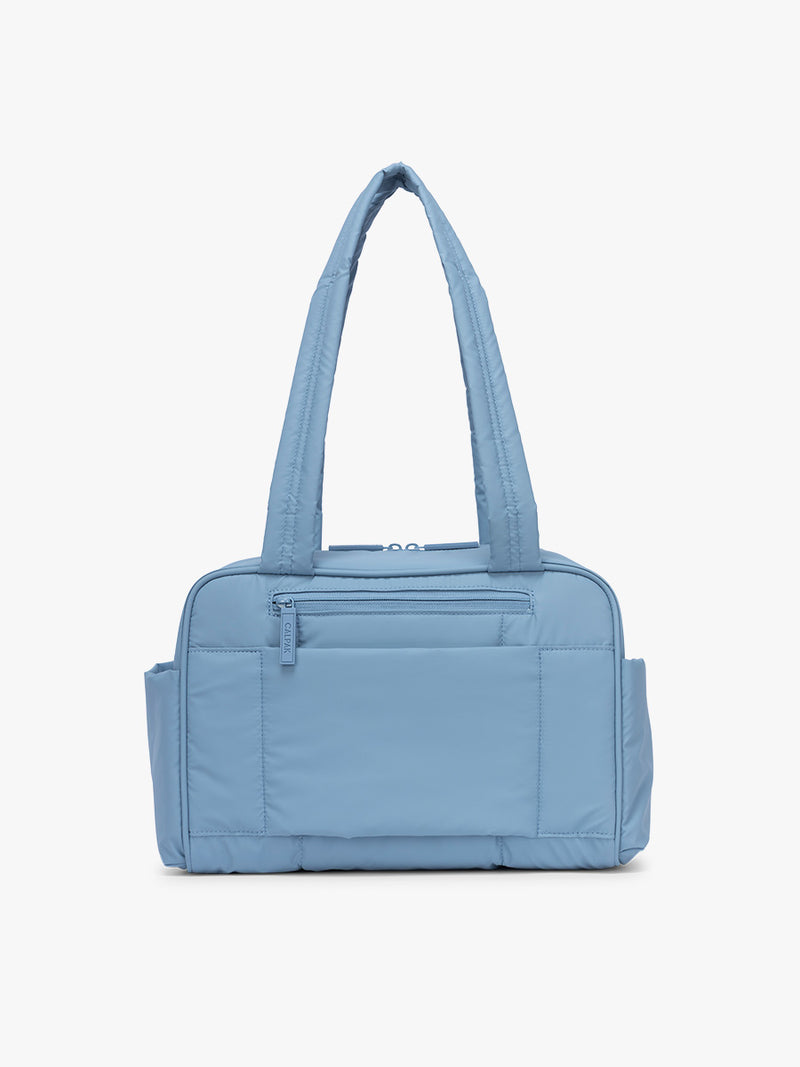 Back side of CALPAK Luka Mini Duffel in light blue French Blue
