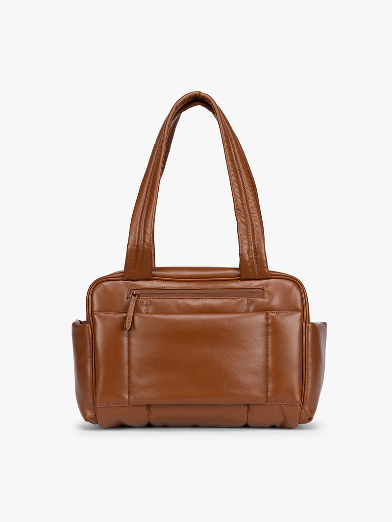 Backside of Honey brown vegan leather CALPAK Luka Mini Duffel with dual top handles and side pockets, photographed against a clean white background