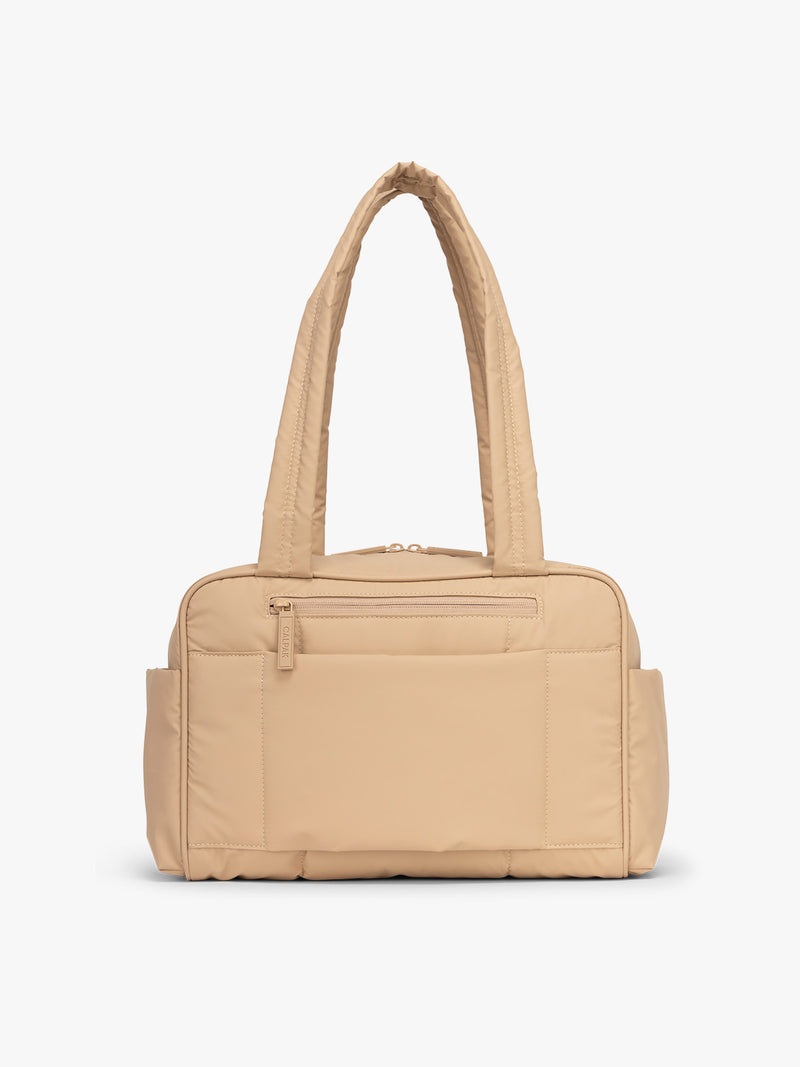 Back side of CALPAK Luka Mini Duffel in beige Latte on a white background