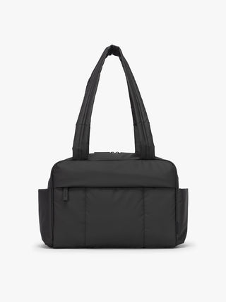 CALPAK Mini Duffel in black front view with puffy exterior, interior and exterior pockets, and padded shoulder straps; DLM2501-MATTE-BLACK